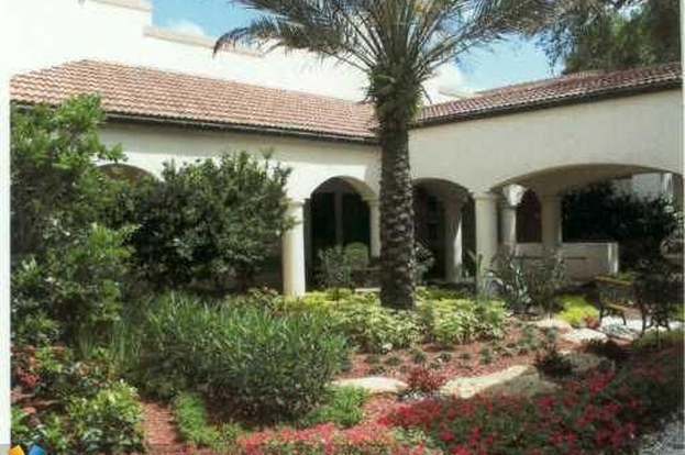 Building Photo - 1831 Sabal Palm Dr