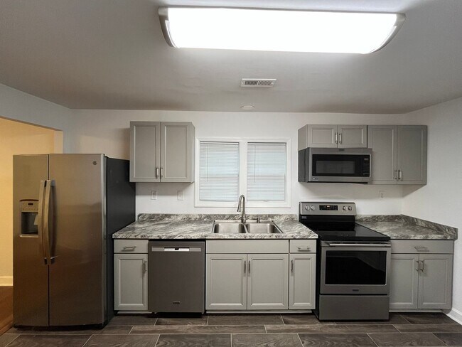 Building Photo - Newly Remodeled 3BD, 2BA Raleigh Home with Fenced Yard in Prime Location Near Downtown Raleigh, N...