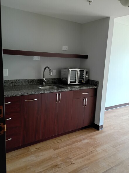 Building Photo - The Current Apartments!