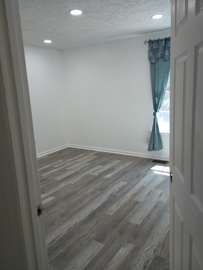 New Floors Freshly Painted - 455 Highland Dr