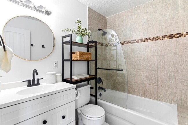Building Photo - "Spacious 3-Bed Oasis with Fireplace & Modern Vinyl Touches in Ogden"