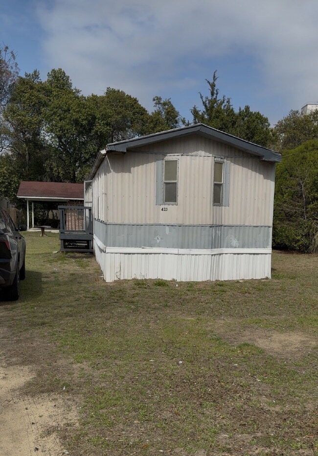 Building Photo - Handyman Special – Land + Home (Rent-to-Own)