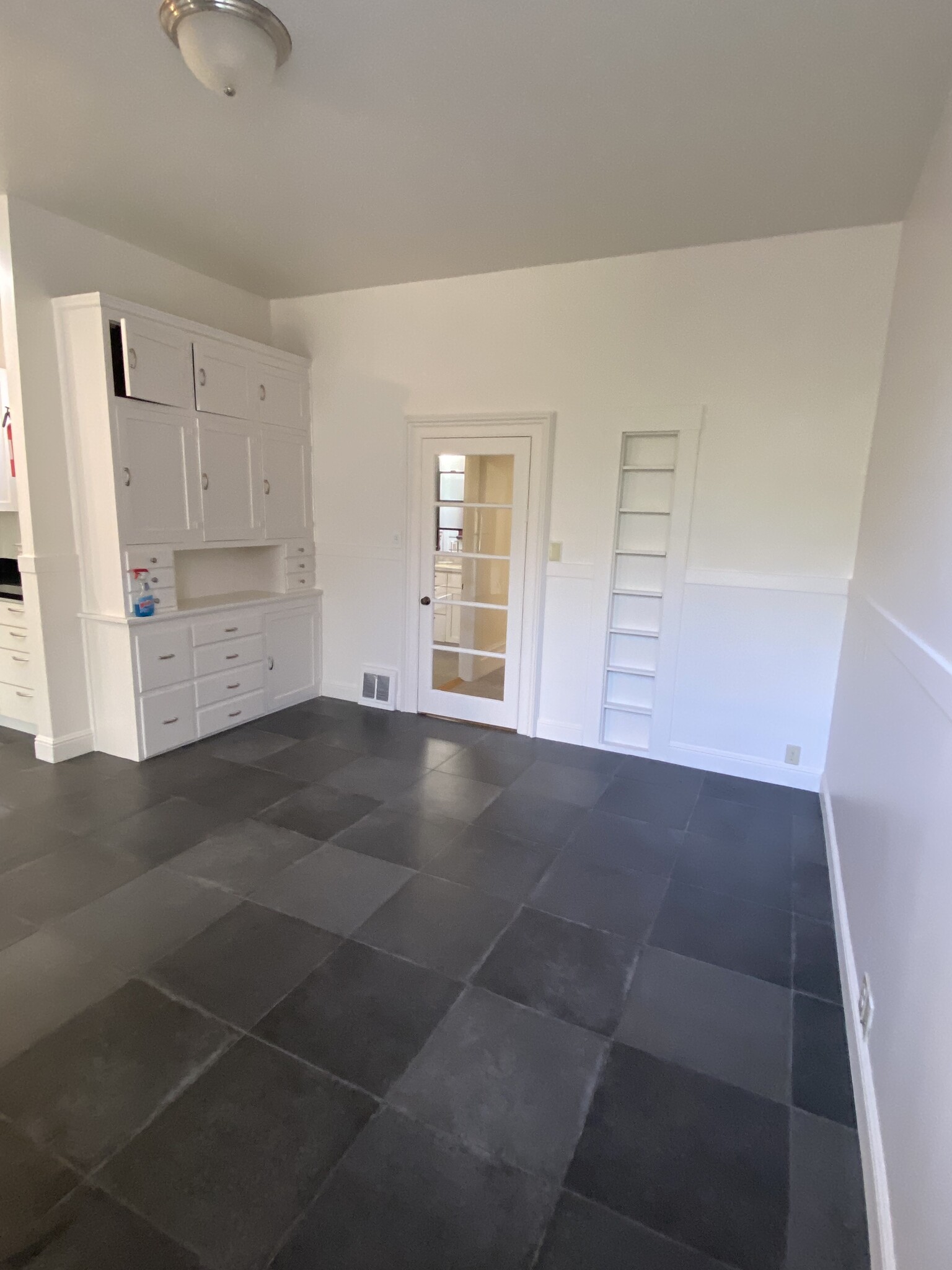 Living room with storage cabinets - 328 Utah St