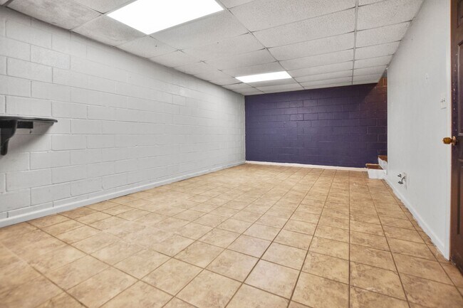 Building Photo - Pet Friendly Three Bedroom with Basement!