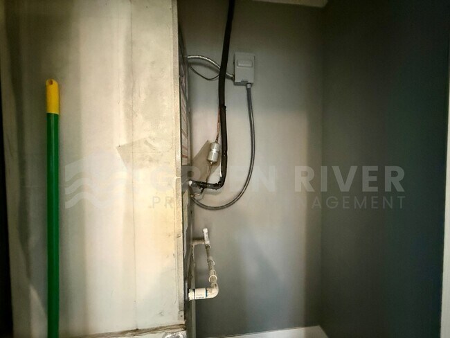 Building Photo - Fully Renovated 2BR Brick Home with Vaulted Ceilings & Backyard Retreat!