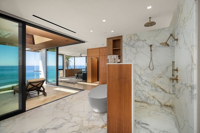 Building Photo - Luxury Coastal Escape w/ Resort-Style Amenities & Stunning Views