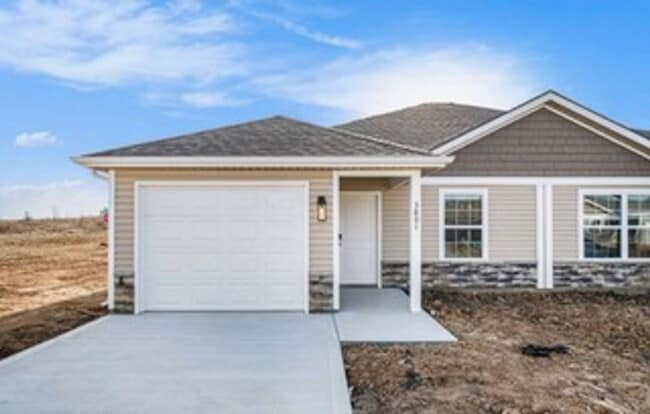Building Photo - 3 Bedroom Townhome Coming Soon! ~Located i...