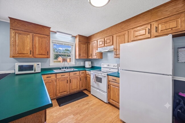 Building Photo - Charming All-Brick 3BR Home with Carport & Easy Charlotte Commute!
