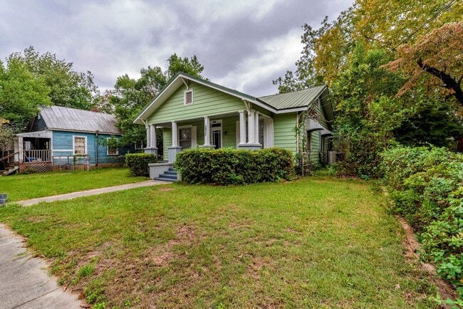 Building Photo - 4 bed/2 bath single-family home for lease ...