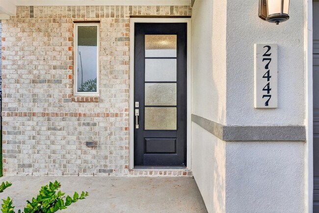 Building Photo - 27447 Sunterra Village Dr