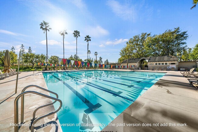 Building Photo - Welcome to this stunning 2-bedroom condo in gated community