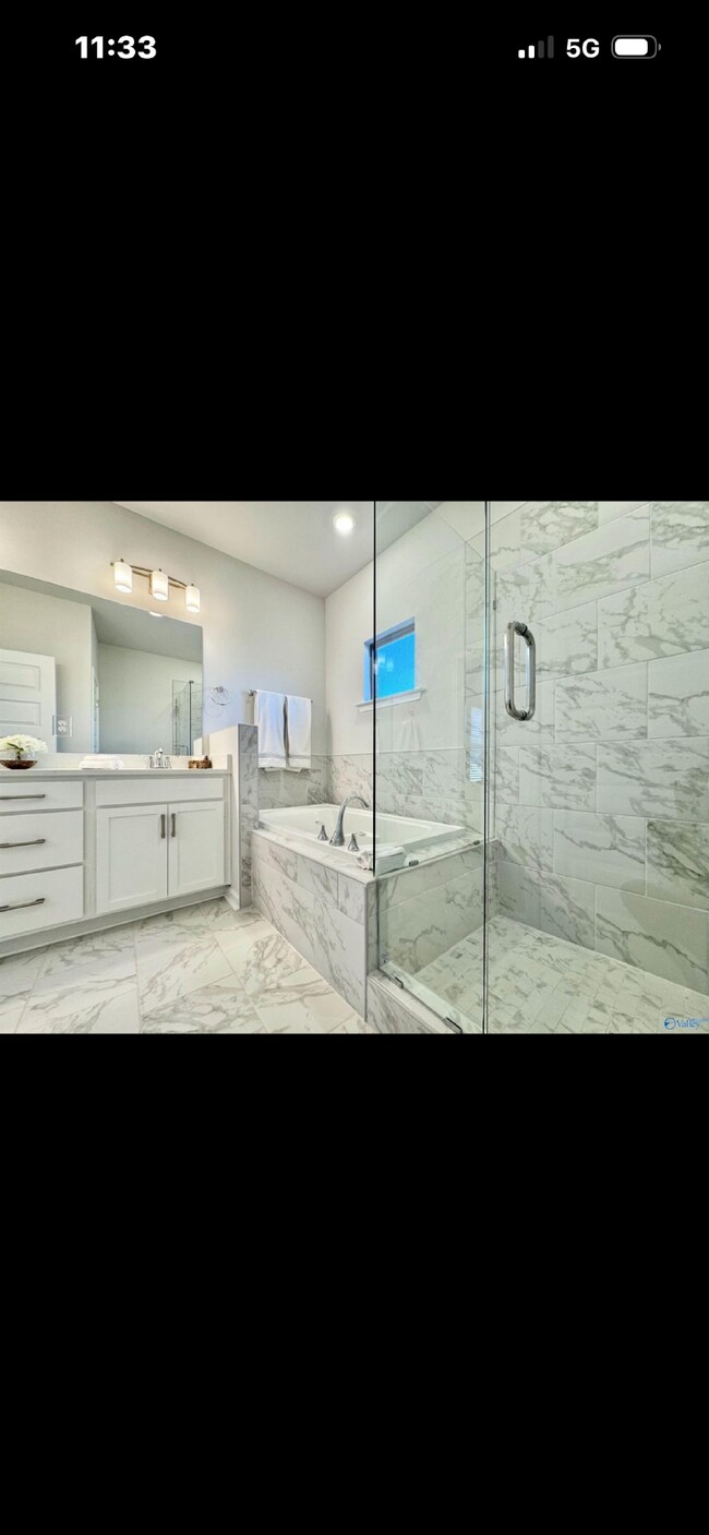 Building Photo - "NEWLY BUILT- Spacious 4-Bedroom Haven with Granite Elegance and Cozy Fireplace in Harvest"
