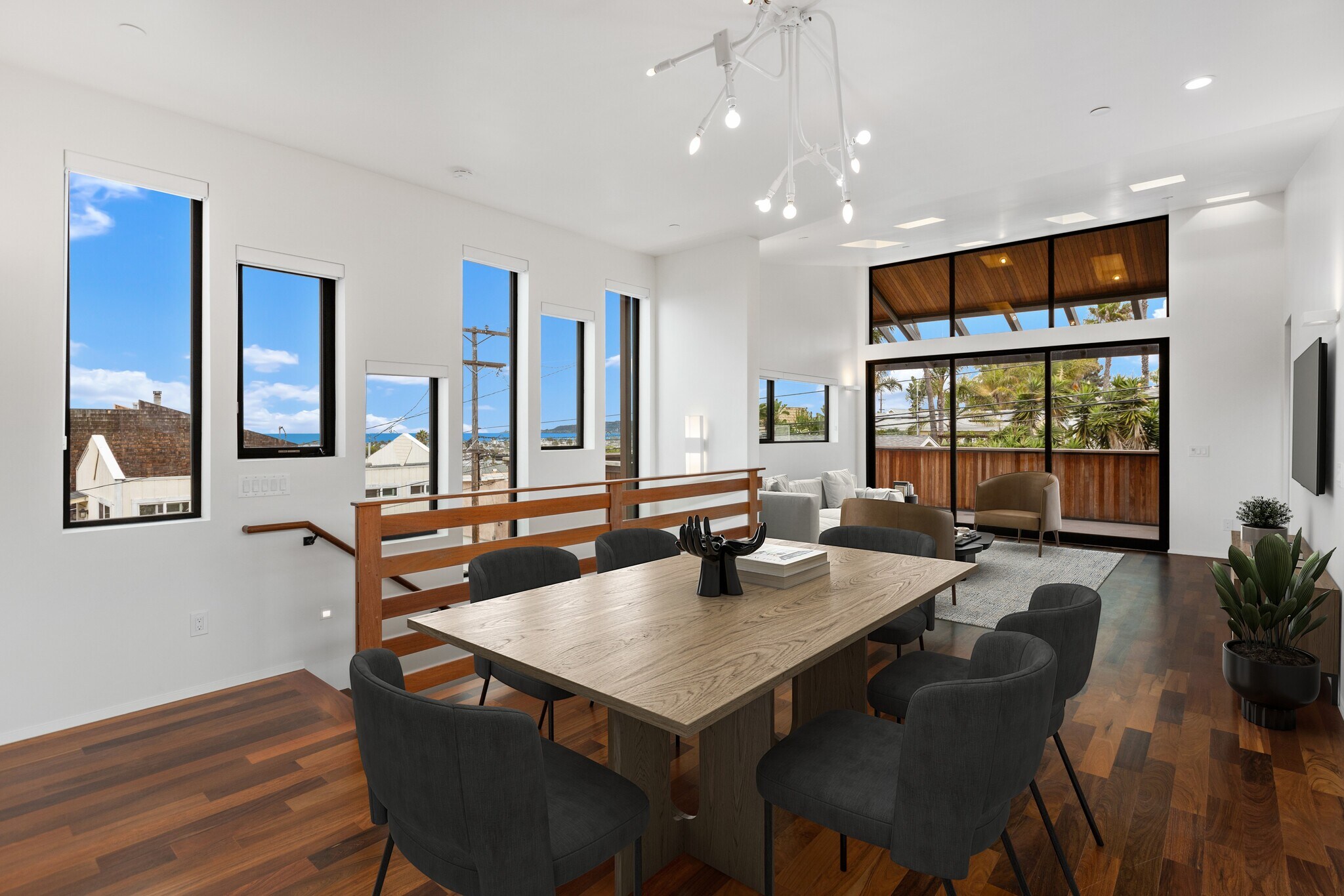 Dining area and living space with peak ocean views. Virtually staged. - 4640 Del Monte Ave