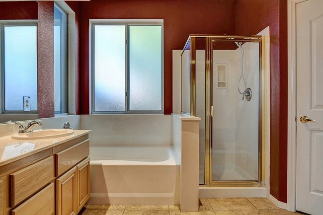 Building Photo - Gorgeous NW Single Story! 3 Car Garage! Serene Backyard.