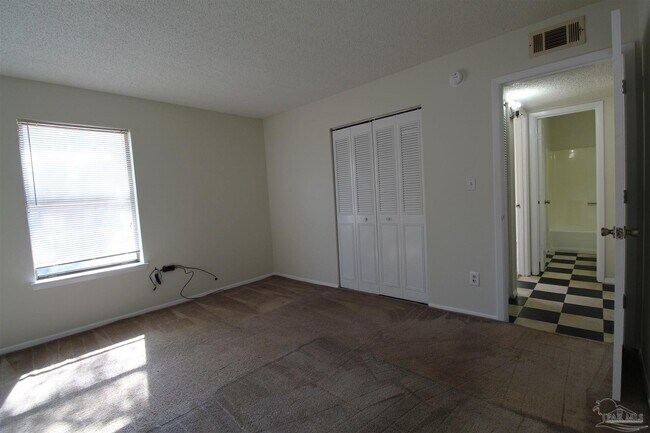 Building Photo - 6801 Tiki Ln