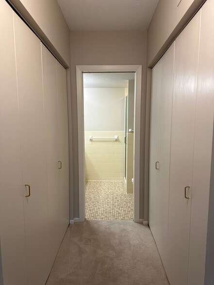 Primary bathroom with two large bifold closets - 4075 W 51st St