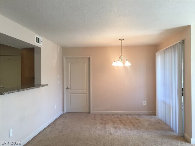 Building Photo - 5055 W Hacienda Ave