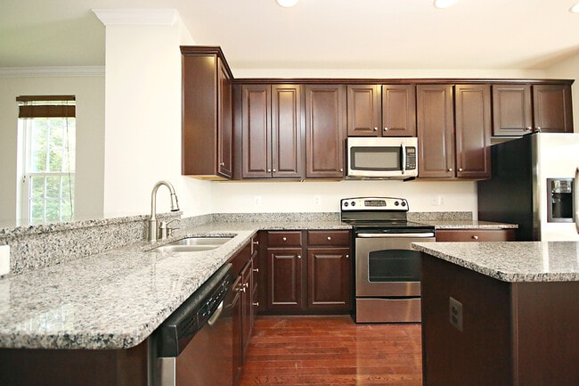 Building Photo - Pet-Friendly N. Albemarle End-Unit Townhome