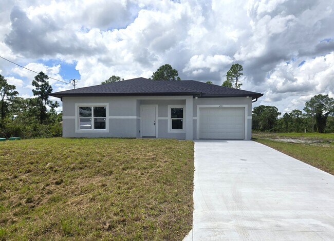 Building Photo - Brand New 2/2/1-South Lehigh Acres