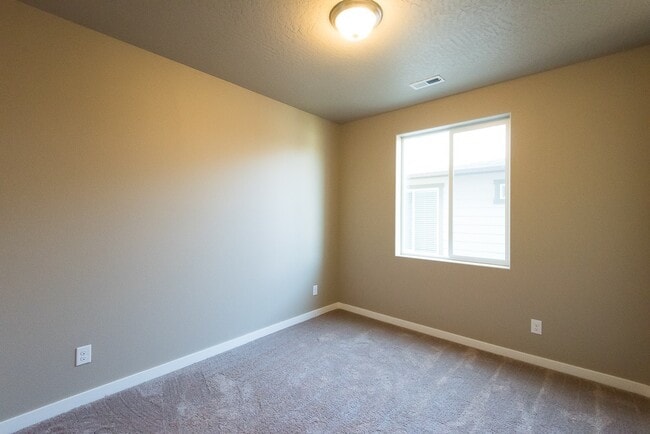 Building Photo - New 4 Bedroom Home in Post Falls with 3 Car Garage!