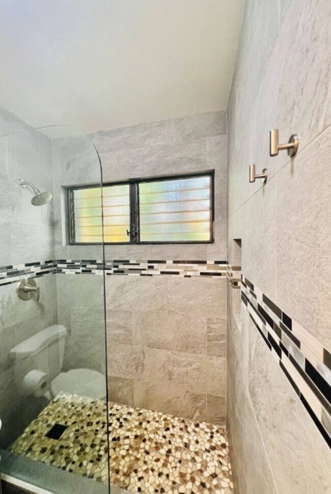 Building Photo - Spacious 2BR/2BA Condo with Garden View – Steps from the Ocean