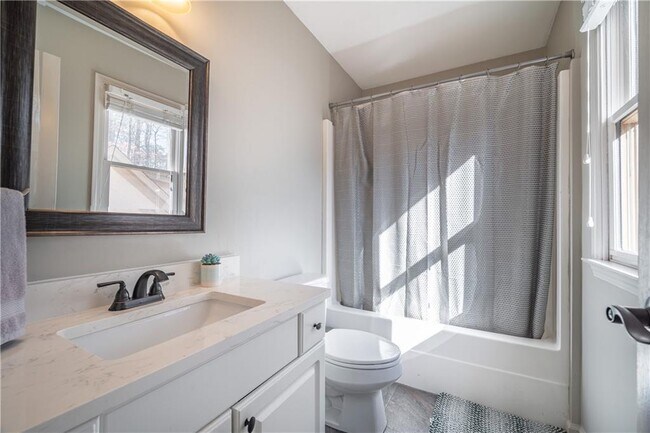 Building Photo - 5041 Towne Lake Hill N