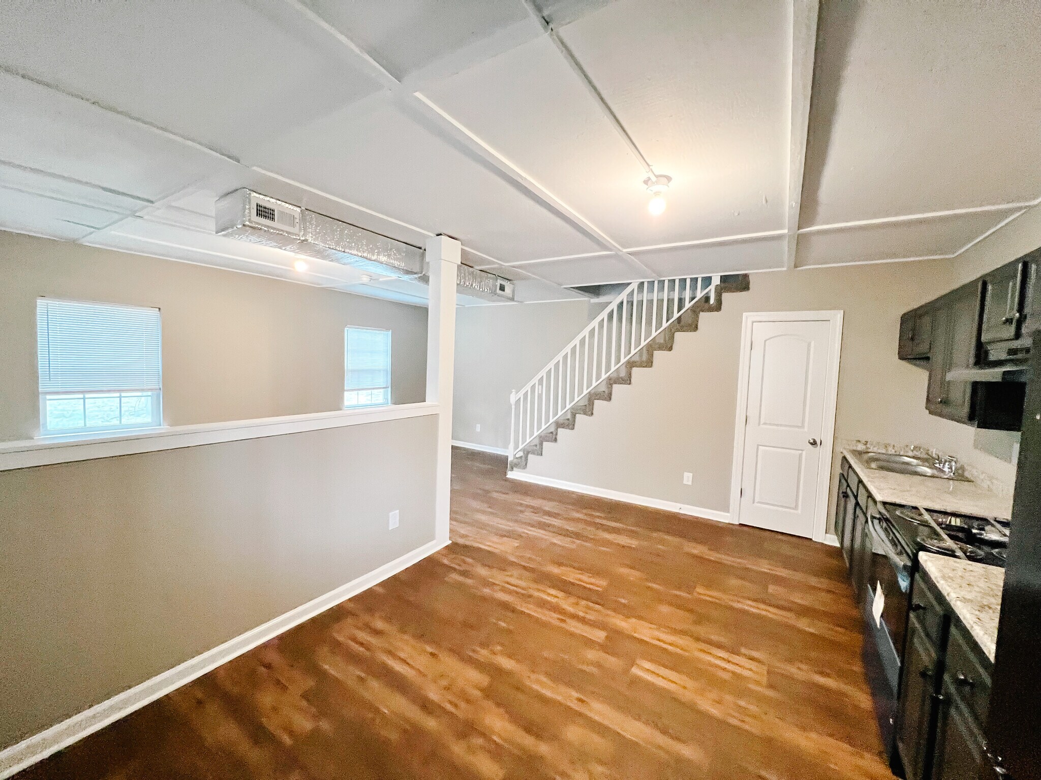 Open concept kitchen, dining and living rooms - 801 Poplar Ave