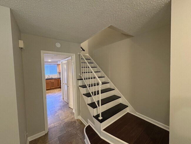 Building Photo - Four Bedroom Townhome Available Now