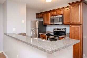 Building Photo - 1/1 Den Upgraded in Brandon in walking dis...