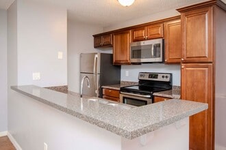 Building Photo - 1BR + Den Condo with Exclusive Move-In Incentive
