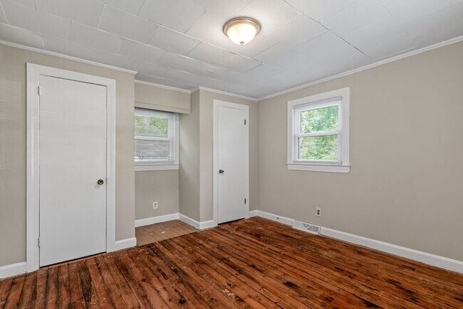 Building Photo - Adorable Home, Just Painted, Wood Flooring...