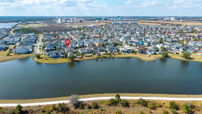 Building Photo - Luxury Waterfront Pool Home in Laureate Park | 4BR + Water Views