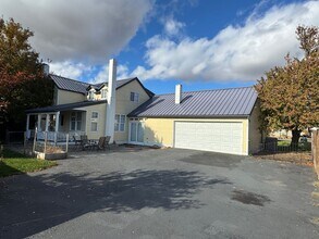 Building Photo - Beautiful 4-Bedroom Home on a Private, Tre...