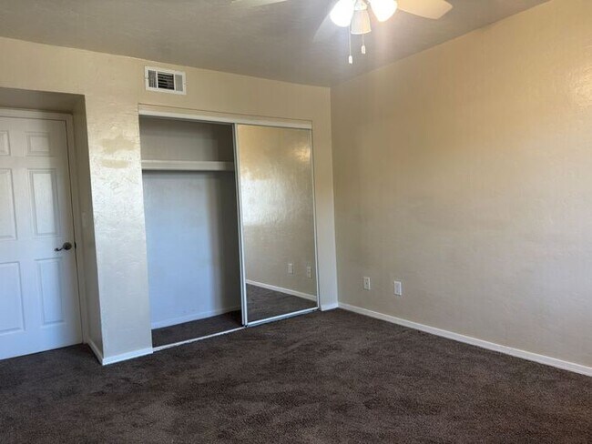 Building Photo - Sun-Drenched 1-Bedroom Condo in Central Tucson | Gated Community with Pool