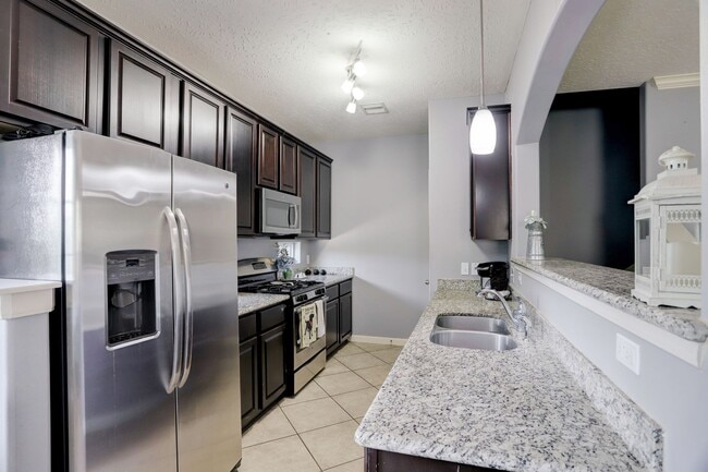 Building Photo - Elegant Two-Story Home in Exclusive Gated ...