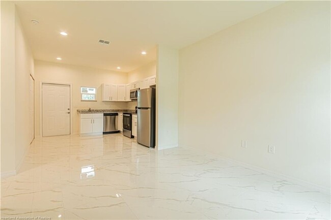Building Photo - BRAND NEW-MOVE IN READY TWO BEDROOM/2 BATH...