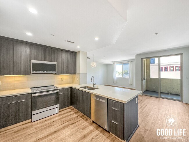 Building Photo - Luminous 3BD/2BA Corner Unit in Little Italy with City Views, W/D & Private Balcony