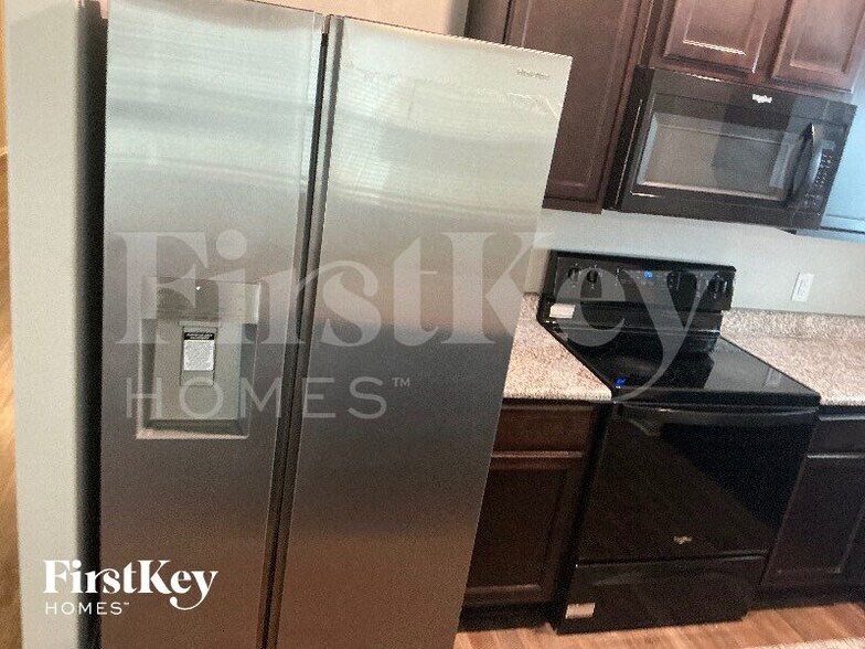 Building Photo - 14219 Chaps Dr