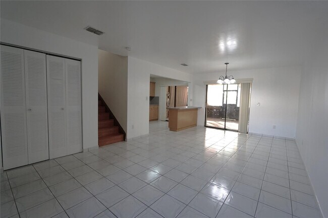 Building Photo - 6380 W 24th Ct