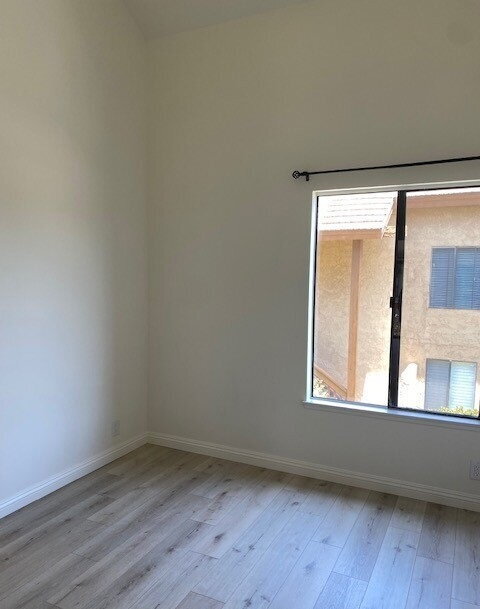 Building Photo - "Charming 1-Bedroom Retreat with Gleaming Hardwood Floors in Prime Irvine Location!"