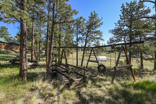 Building Photo - 3 bed 2 Bath Log Home on 2 Acres in Florissant