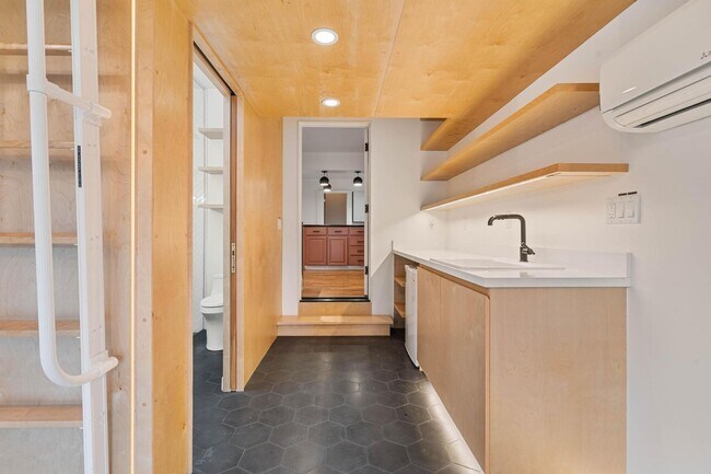 Building Photo - Beautiful, modern 4-bdrm/2-bath home in Concordia—Private, urban sanctuary w/ flex spaces