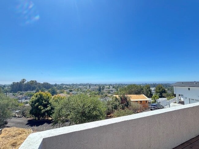 Building Photo - Stunning Hilltop Retreat with Panoramic Oc...