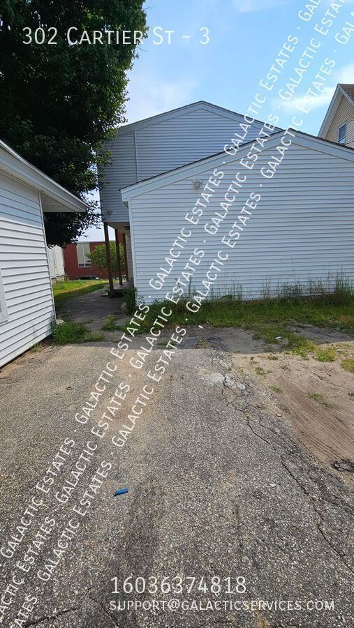 Building Photo - 302 Cartier St
