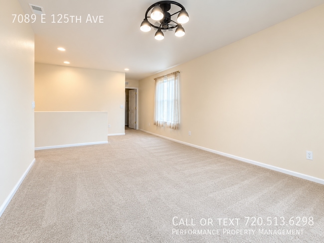 Building Photo - 7089 E 125th Ave
