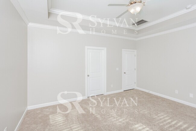 Building Photo - The living is easy in this lovely 5 bedroo...