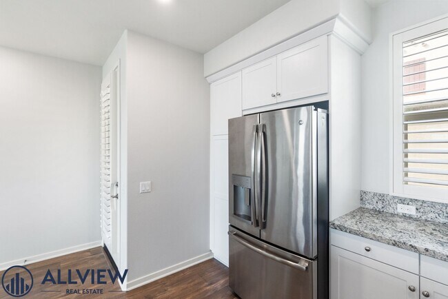 Building Photo - Modern Tri-Level Townhome with Office, 2-Car Garage & Prime Anaheim Location!