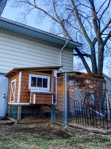 Ready to move in chicken coop for up to six chickens. Predator proof run and an automatic door. - 819 Edmund Ave