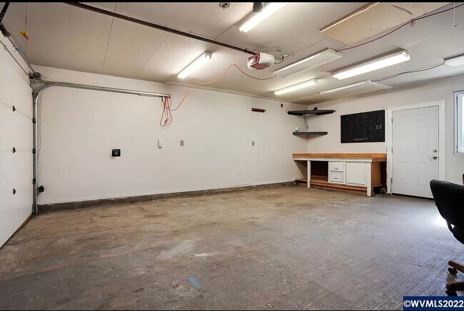 Building Photo - Available Now! 5 bedroom house with large yard and RV parking!