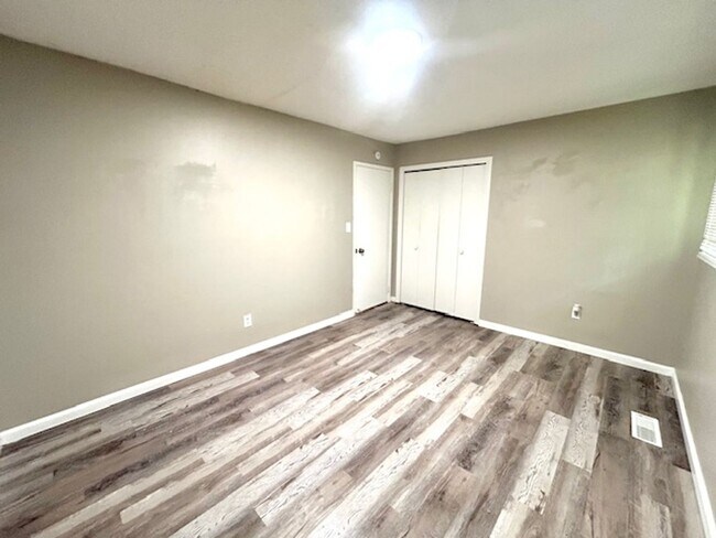 Building Photo - Spacious 4-Bedroom, 2-Bath Home Located in...